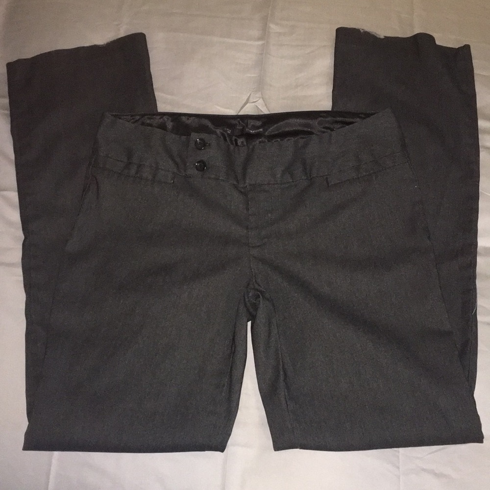 Maurice’s grey slacks